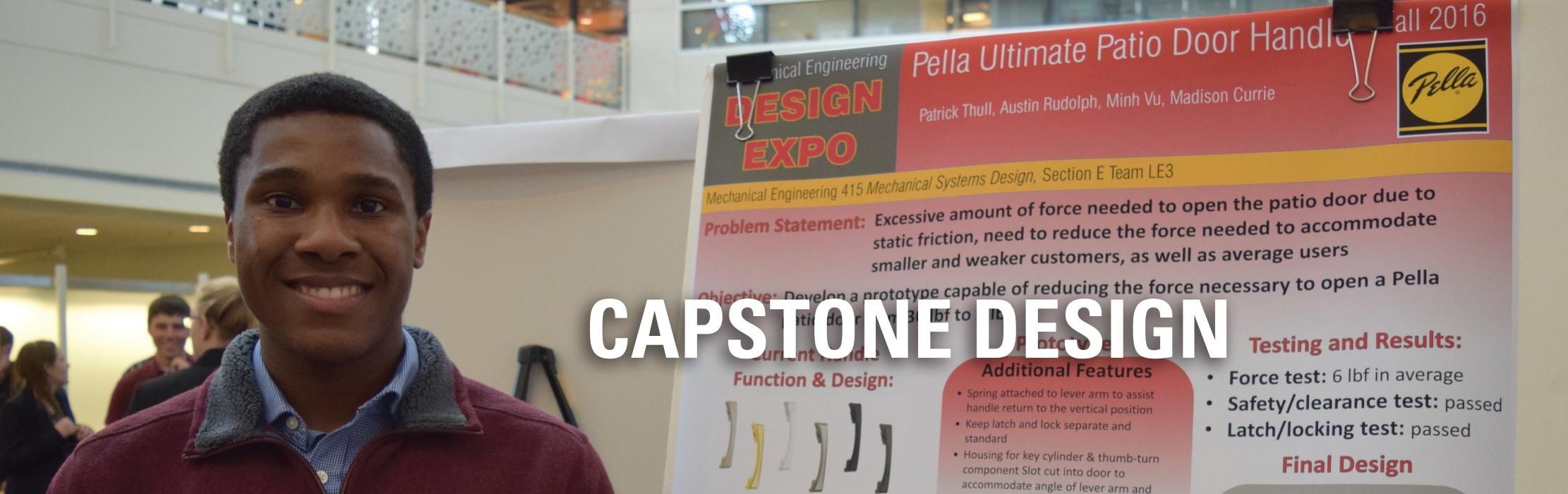 An ISU student standing next to a poster presentation: Capstone Design.