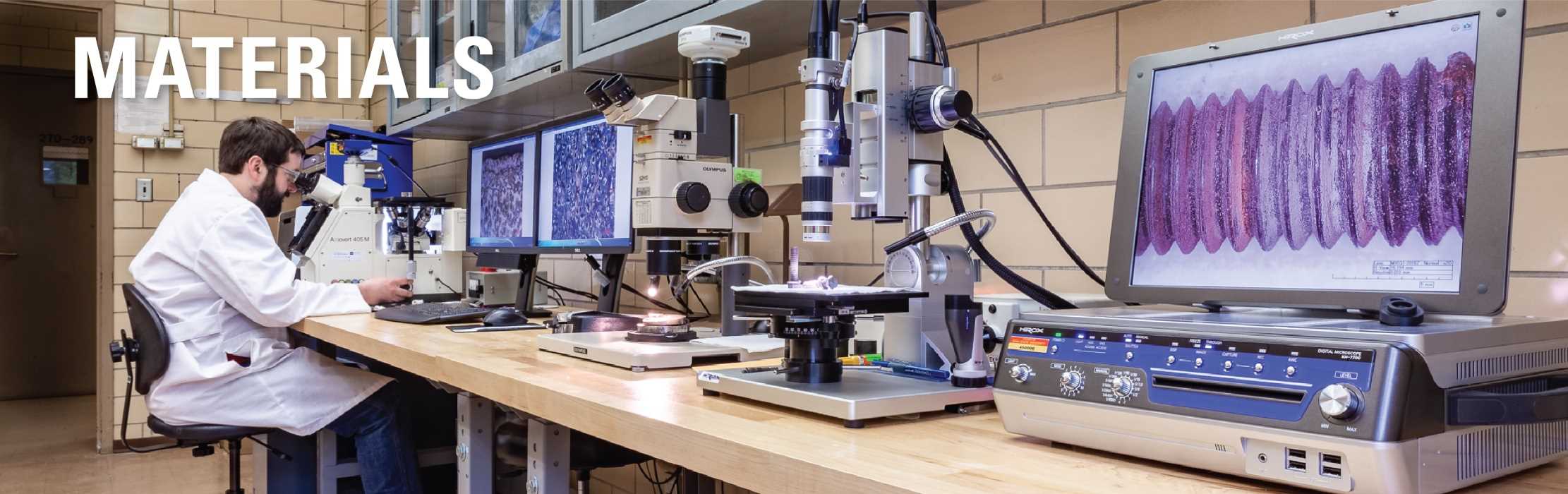 A scientist studying a problem in an ISU laboratory: Materials.