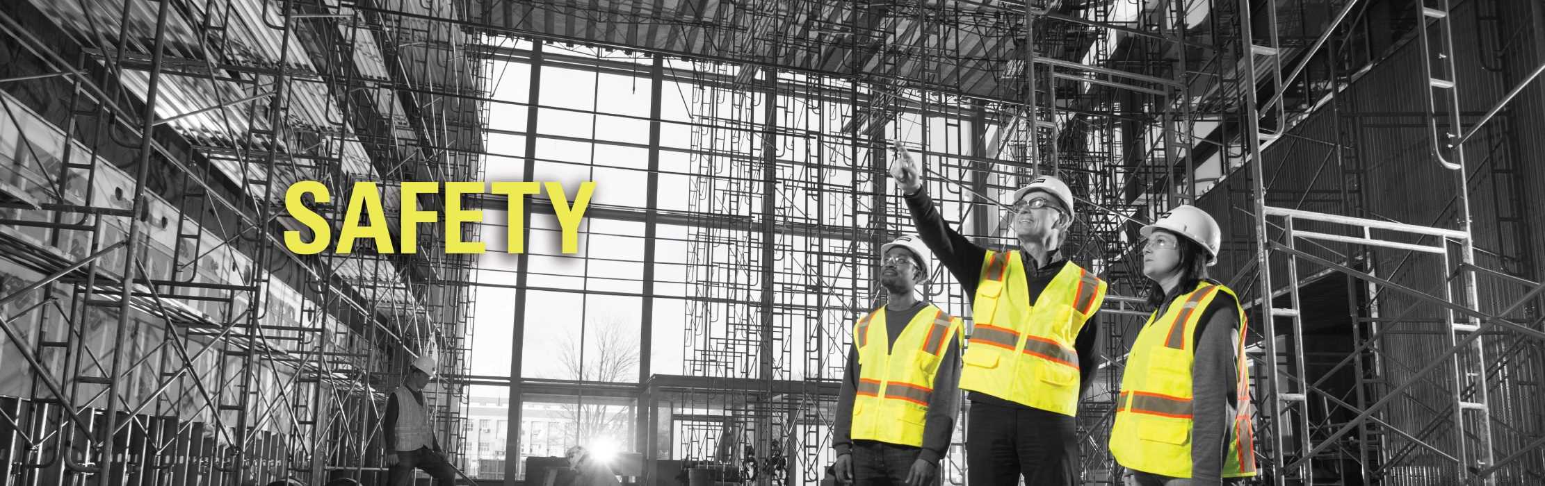 Construction workers examining the inside of a building: Safety.