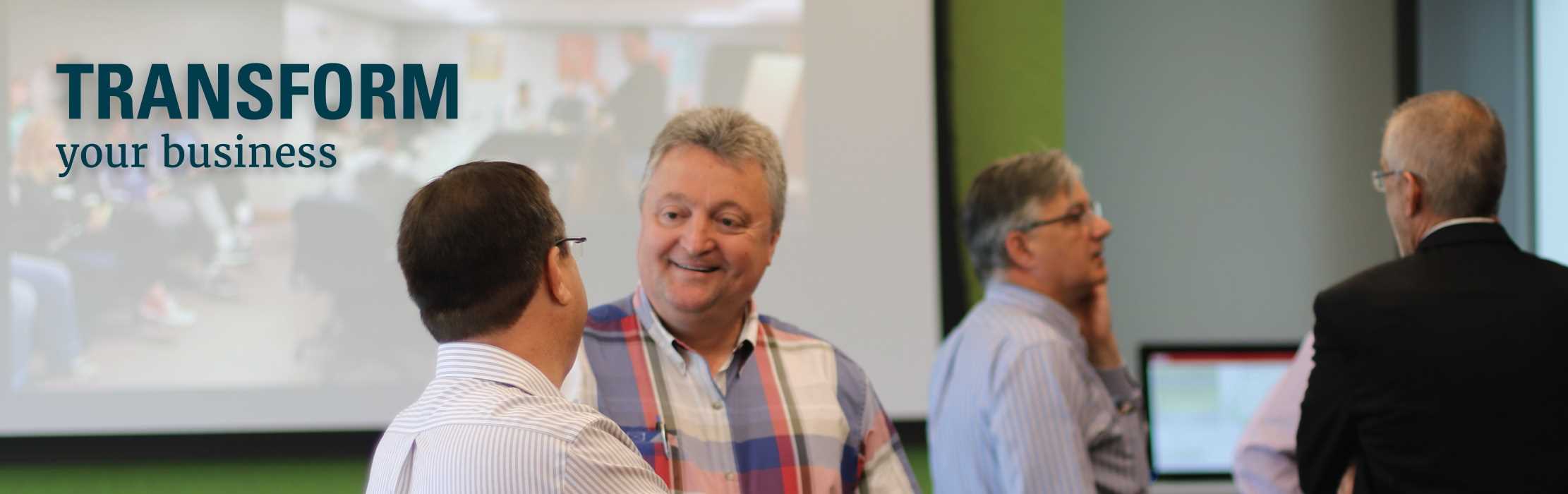 Discussion after a meeting: Transform Your Business.