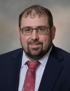 Photo of Adam Lathrop. Click for large version.